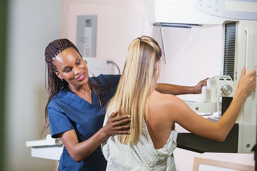 woman patient with doctor - cancer screening